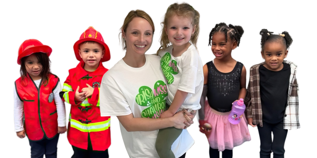 A cheerful group of children and teacher poses together, showcasing smiles and a warm, friendly atmosphere.